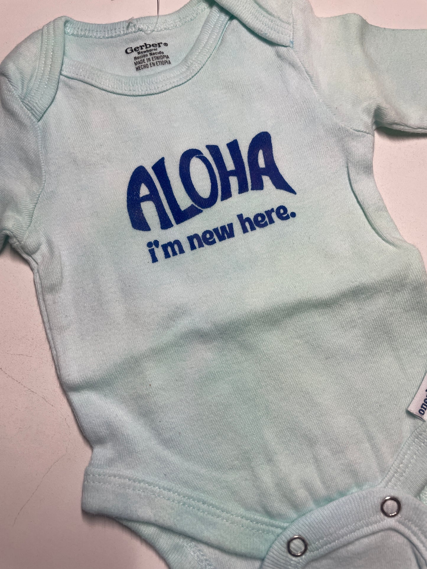 ALOHA I’M NEW HERE bodysuit